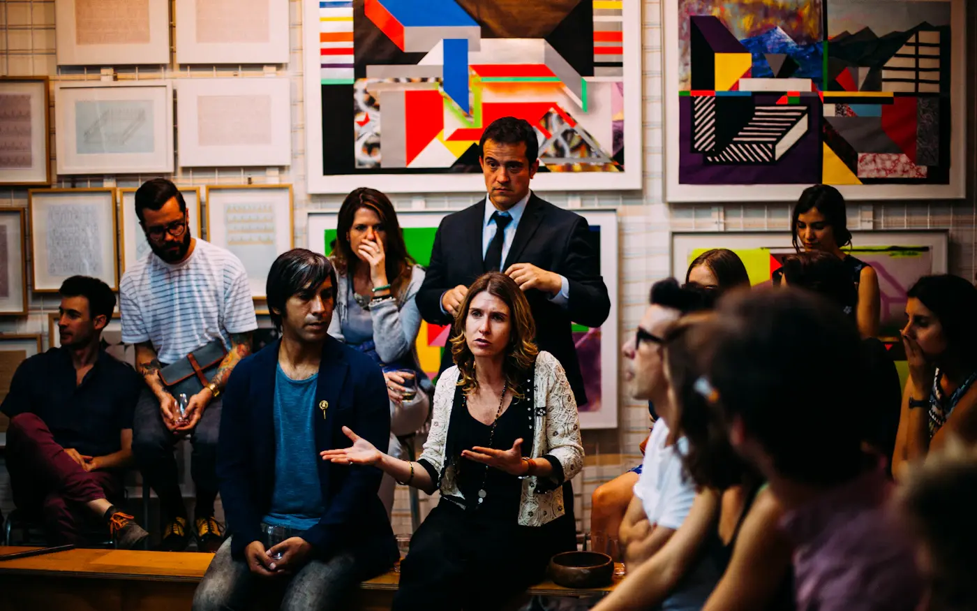 A group of adults taking part in a community discussion